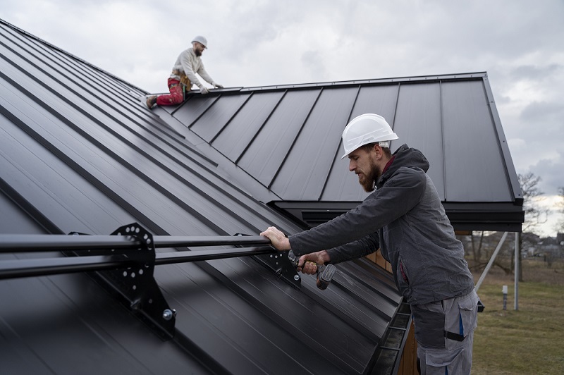 1753771570-medium-shot-men-working-roof-together_(1).jpg