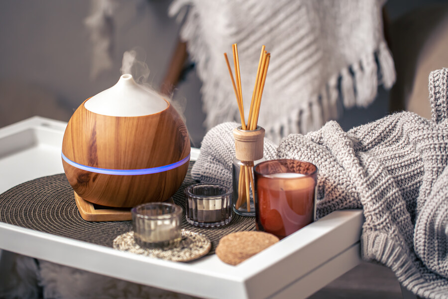 1762864489-cozy-composition-with-aroma-diffuser-candles-home-interior_(1).jpg