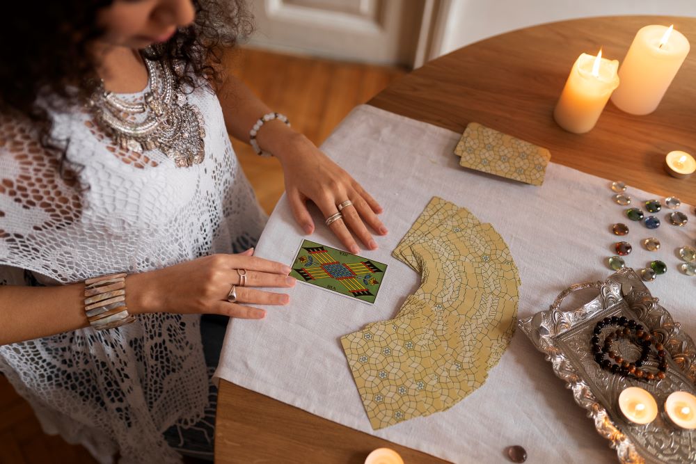 high-angle-woman-reading-tarot.jpg